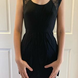 Black mini dress with see through back